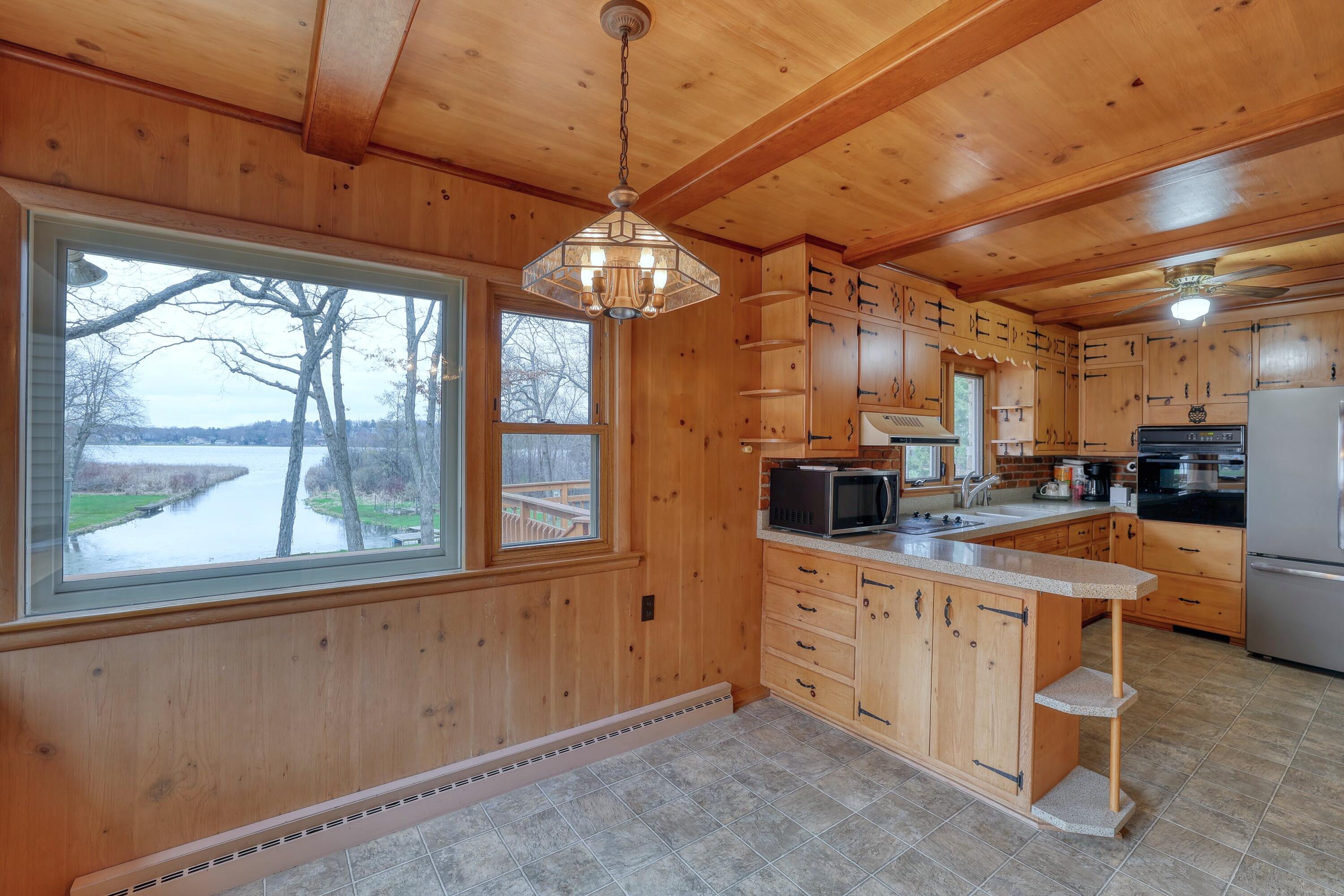 3513 Ridge Drive, Unit 3507 Delafield, WI 53029 - Photo 6 of 29 Dinette