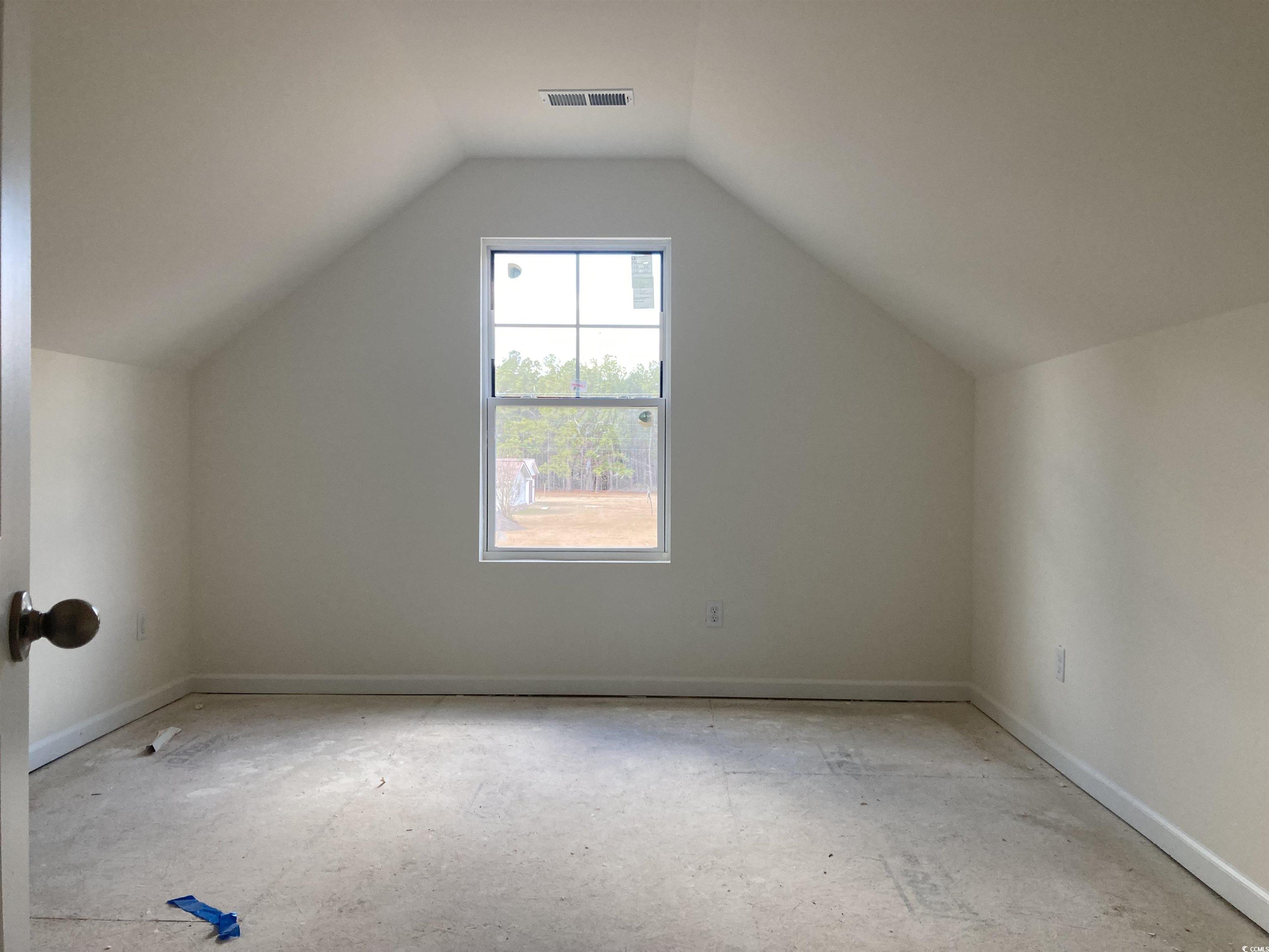 1060 Log Cabin Road Loris, SC 29569 - Photo 12 of 32 Bonus room with vaulted ceiling