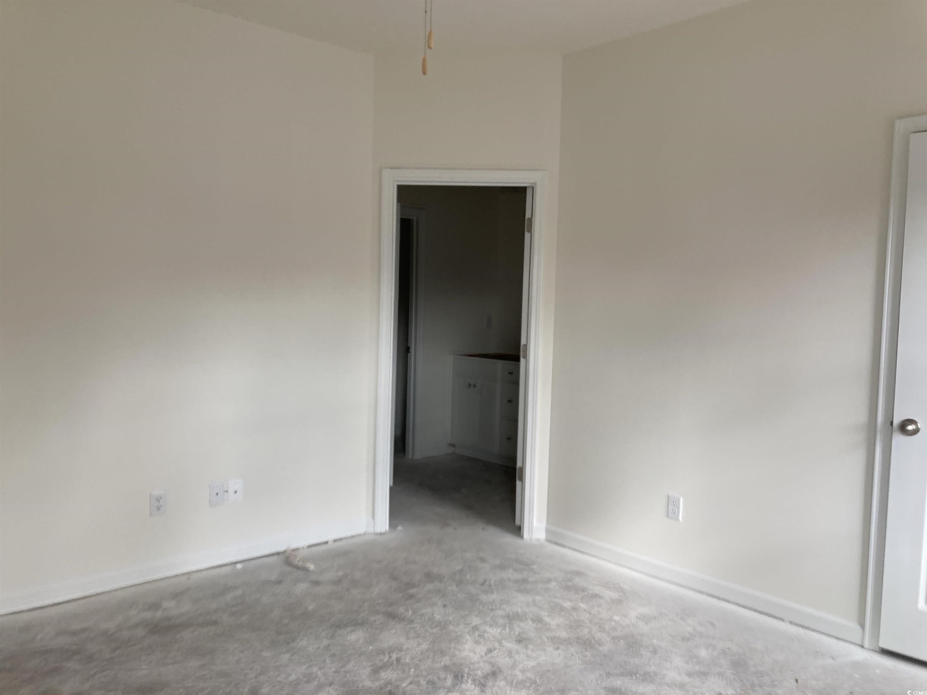 1060 Log Cabin Road Loris, SC 29569 - Photo 21 of 32 Empty room with light colored carpet