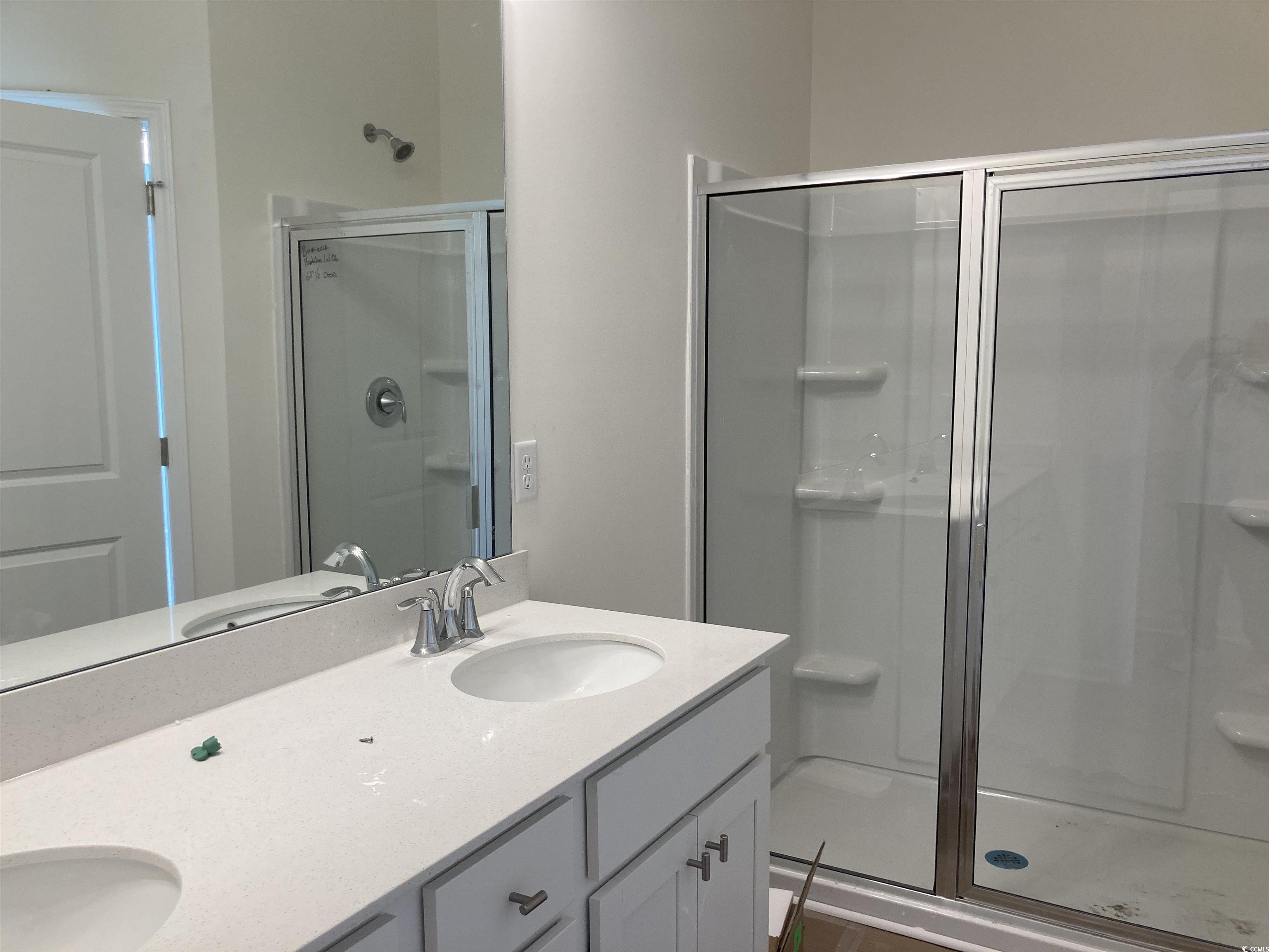 1060 Log Cabin Road Loris, SC 29569 - Photo 8 of 32 Bathroom featuring double vanity, a stall shower,