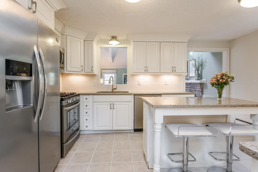 151 Peach Tree Road Marstons Mills, MA 02648 - Photo 19 of 49 a kitchen with stainless steel appliances granite countertop a refrigerator sink and stove