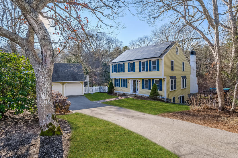 151 Peach Tree Road Marstons Mills, MA 02648 - Photo 2 of 49 a view of a big house with a big yard and large trees