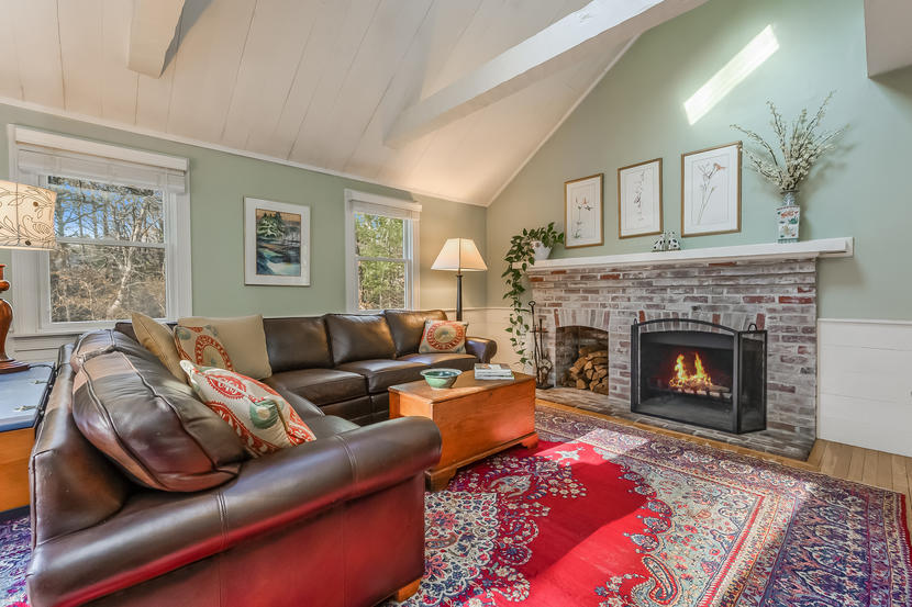 151 Peach Tree Road Marstons Mills, MA 02648 - Photo 24 of 49 a living room with furniture and a fireplace