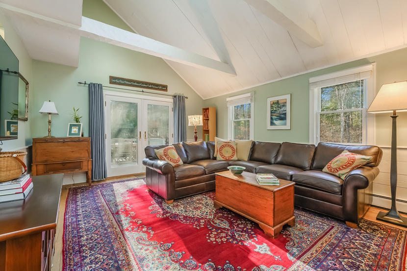 151 Peach Tree Road Marstons Mills, MA 02648 - Photo 27 of 49 a living room with furniture large windows and wooden floor