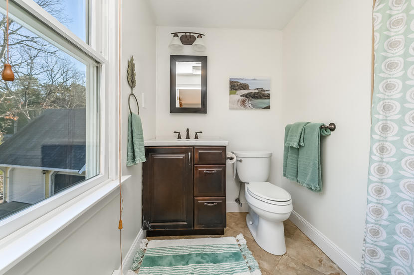 151 Peach Tree Road Marstons Mills, MA 02648 - Photo 30 of 49 a bathroom with a toilet and a sink