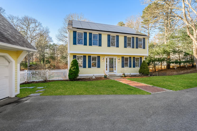 151 Peach Tree Road Marstons Mills, MA 02648 - Photo 3 of 49 a front view of a house with yard and green space