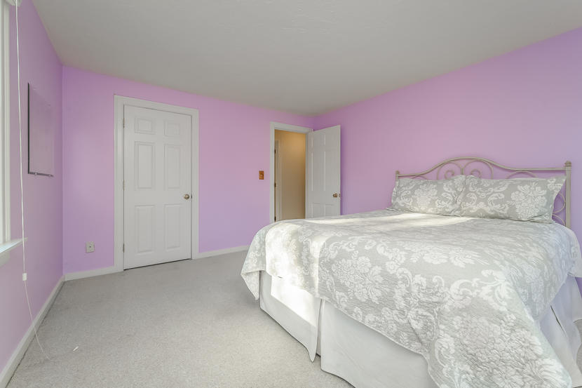 151 Peach Tree Road Marstons Mills, MA 02648 - Photo 32 of 49 a bedroom with pink walls and pink rug