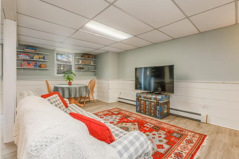 151 Peach Tree Road Marstons Mills, MA 02648 - Photo 39 of 49 a bedroom with furniture and flat screen tv