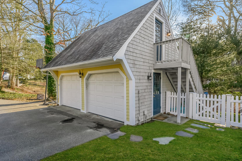 151 Peach Tree Road Marstons Mills, MA 02648 - Photo 4 of 49 a view of a small house with wooden fence