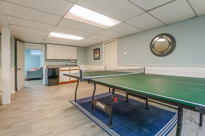151 Peach Tree Road Marstons Mills, MA 02648 - Photo 42 of 49 a room with lots of table chair and windows