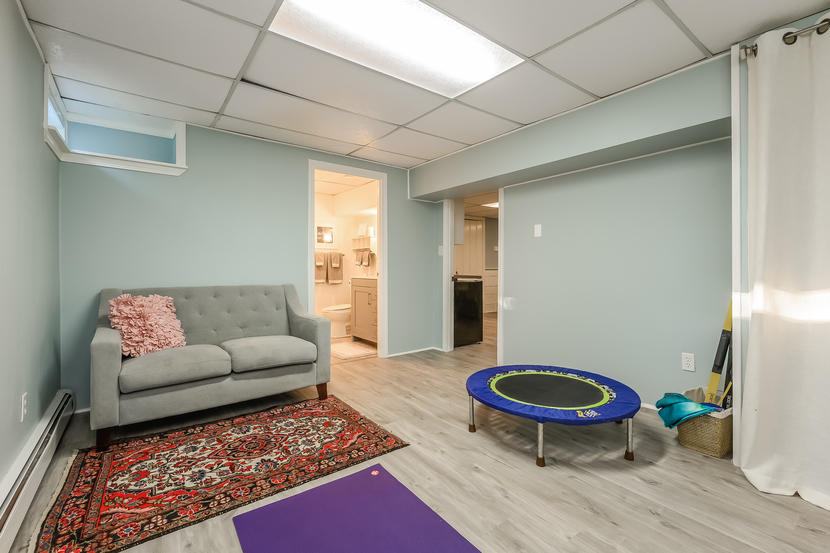 151 Peach Tree Road Marstons Mills, MA 02648 - Photo 45 of 49 a living room with furniture and a rug