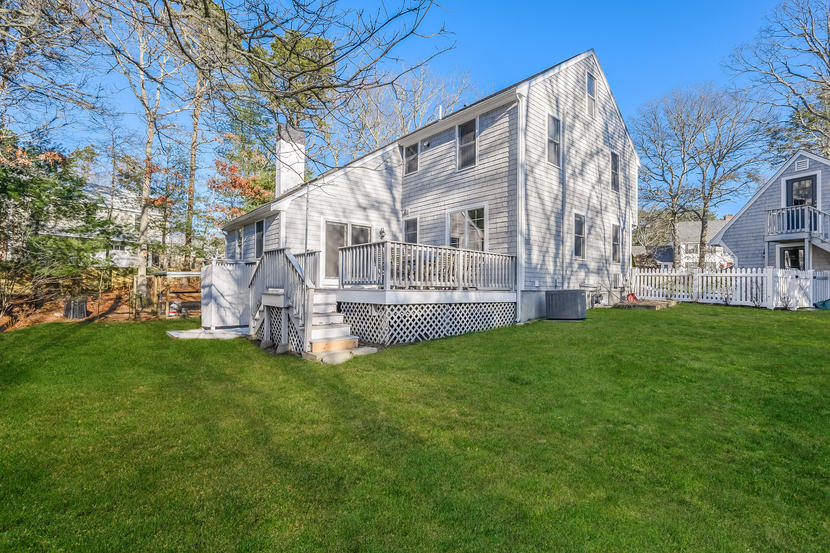 151 Peach Tree Road Marstons Mills, MA 02648 - Photo 6 of 49 a view of a house with a yard