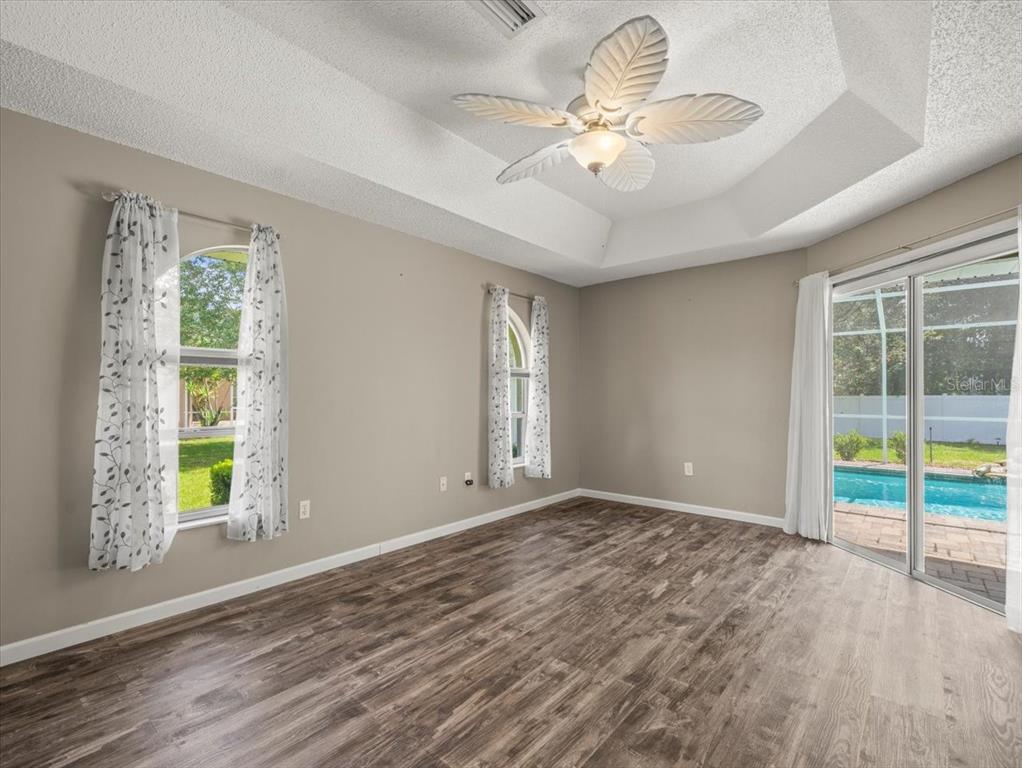 14717 Linden Drive Spring Hill, FL 34609 - Photo 13 of 29 a view of an empty room with a window