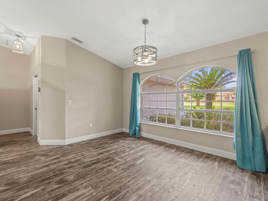 14717 Linden Drive Spring Hill, FL 34609 - Photo 18 of 29 a view of an empty room with a window