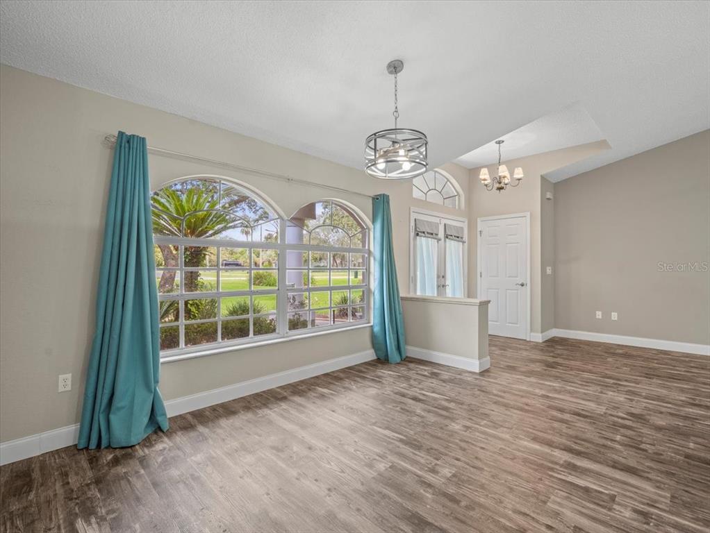 14717 Linden Drive Spring Hill, FL 34609 - Photo 19 of 29 a view of an empty room with a window