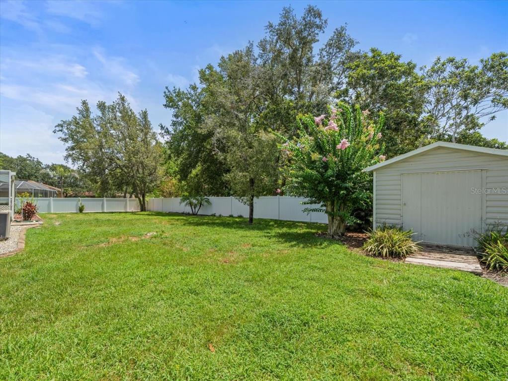 14717 Linden Drive Spring Hill, FL 34609 - Photo 26 of 29 a view of a backyard