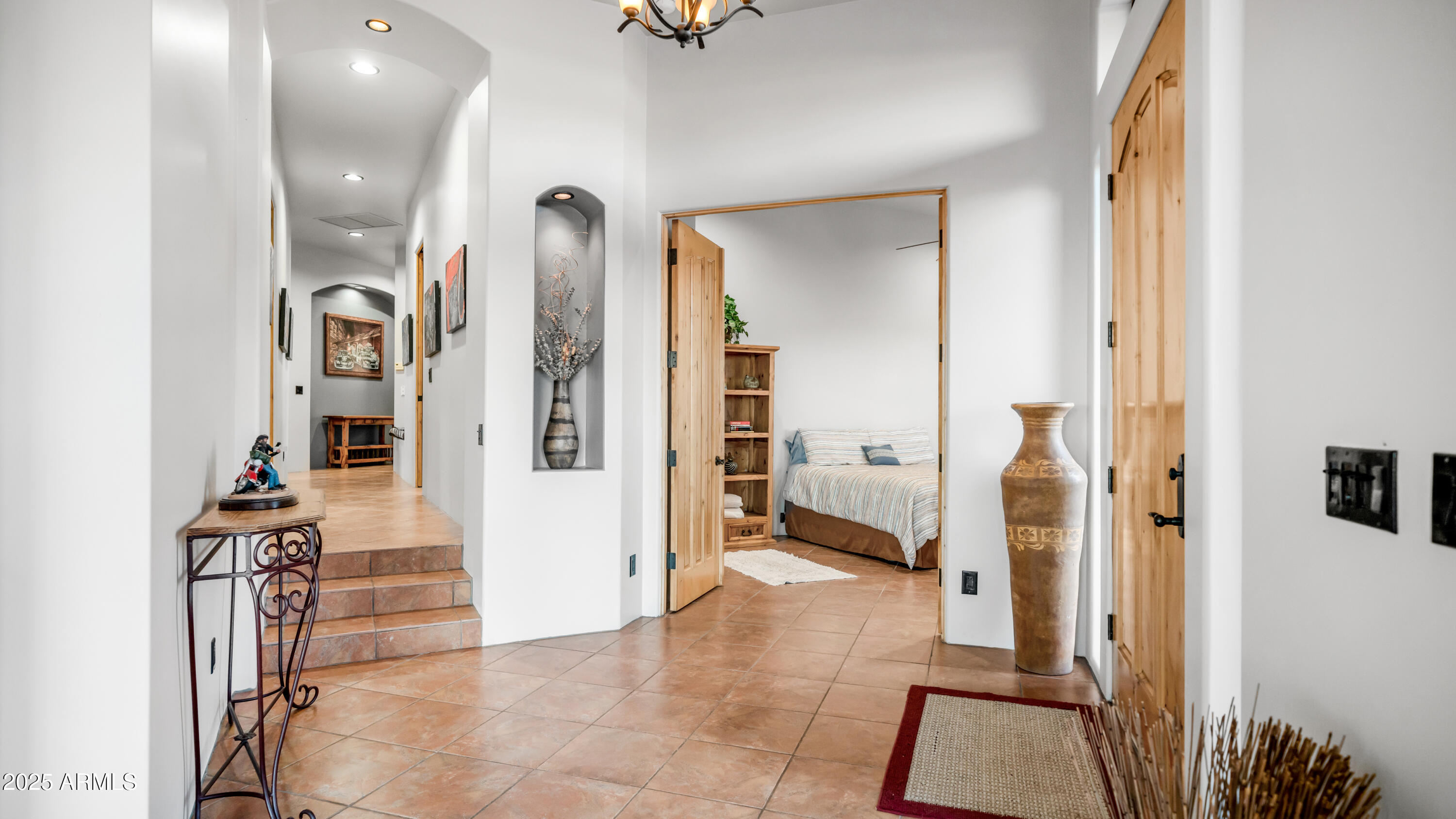 42215 North La Plata Road Scottsdale, AZ 85262 - Photo 18 of 93 a view of a hallway with wooden floor and a living room