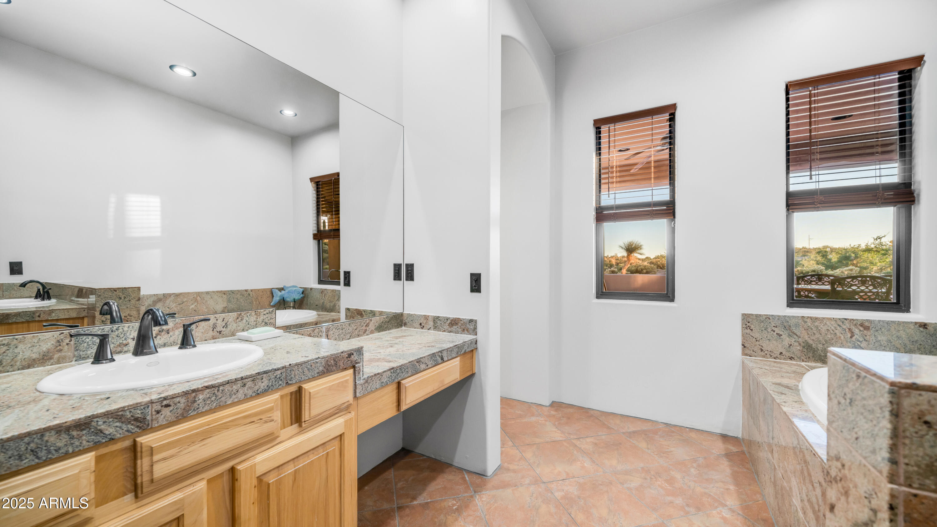 42215 North La Plata Road Scottsdale, AZ 85262 - Photo 26 of 93 a bathroom with a granite countertop sink and a mirror