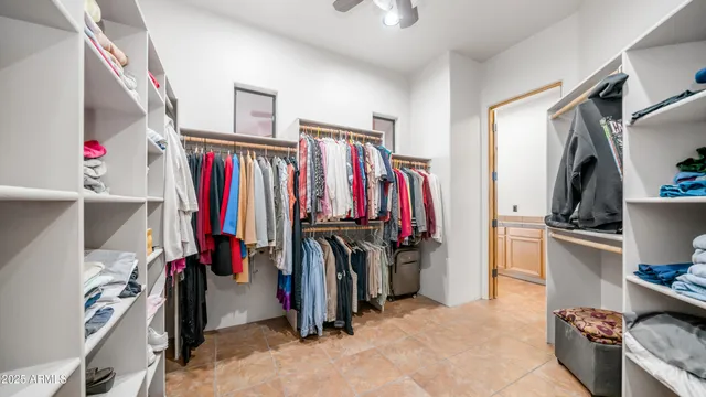 a living room with furniture kitchen view and a table