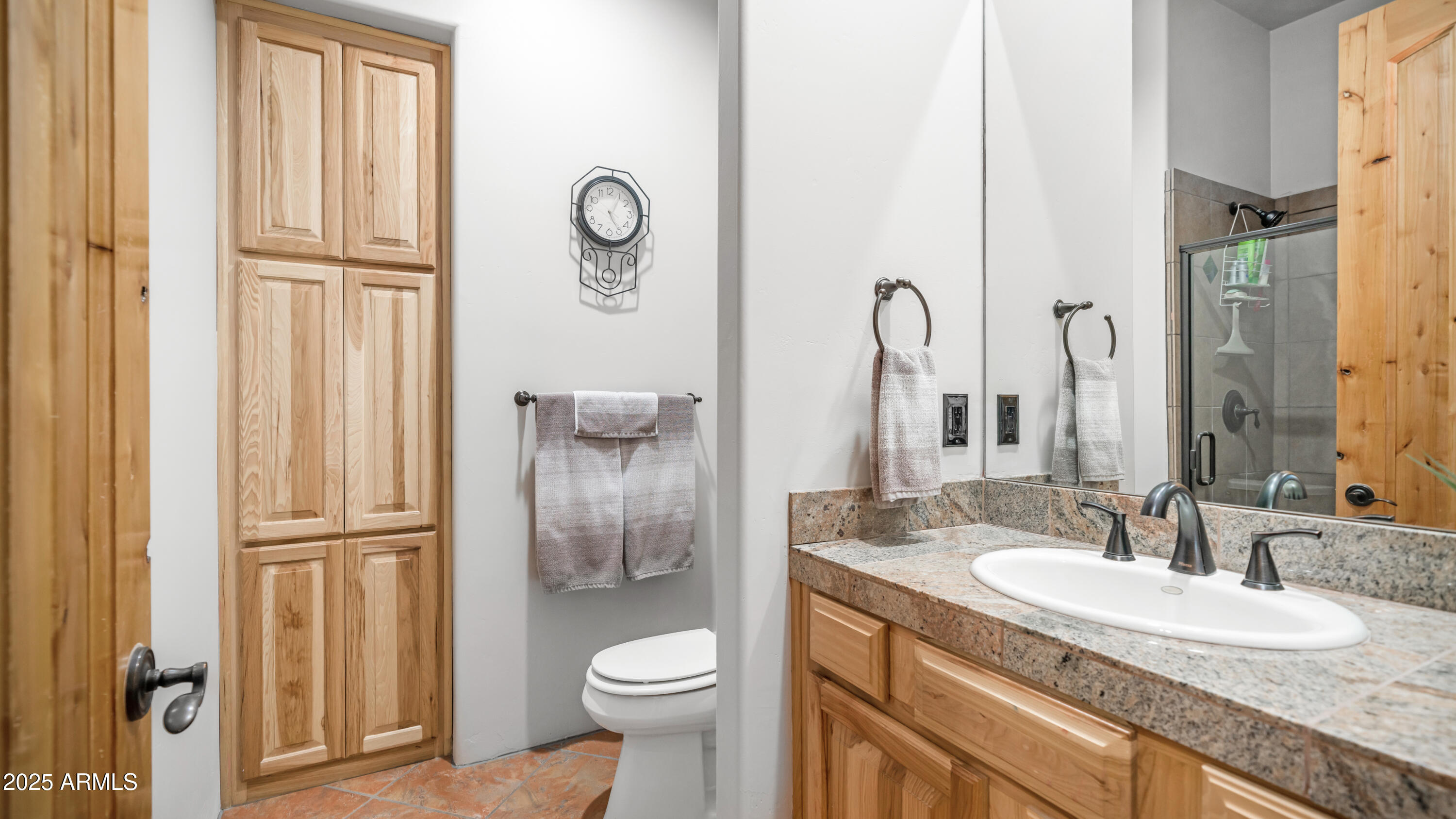 42215 North La Plata Road Scottsdale, AZ 85262 - Photo 39 of 93 a bathroom with a granite countertop sink toilet and shower