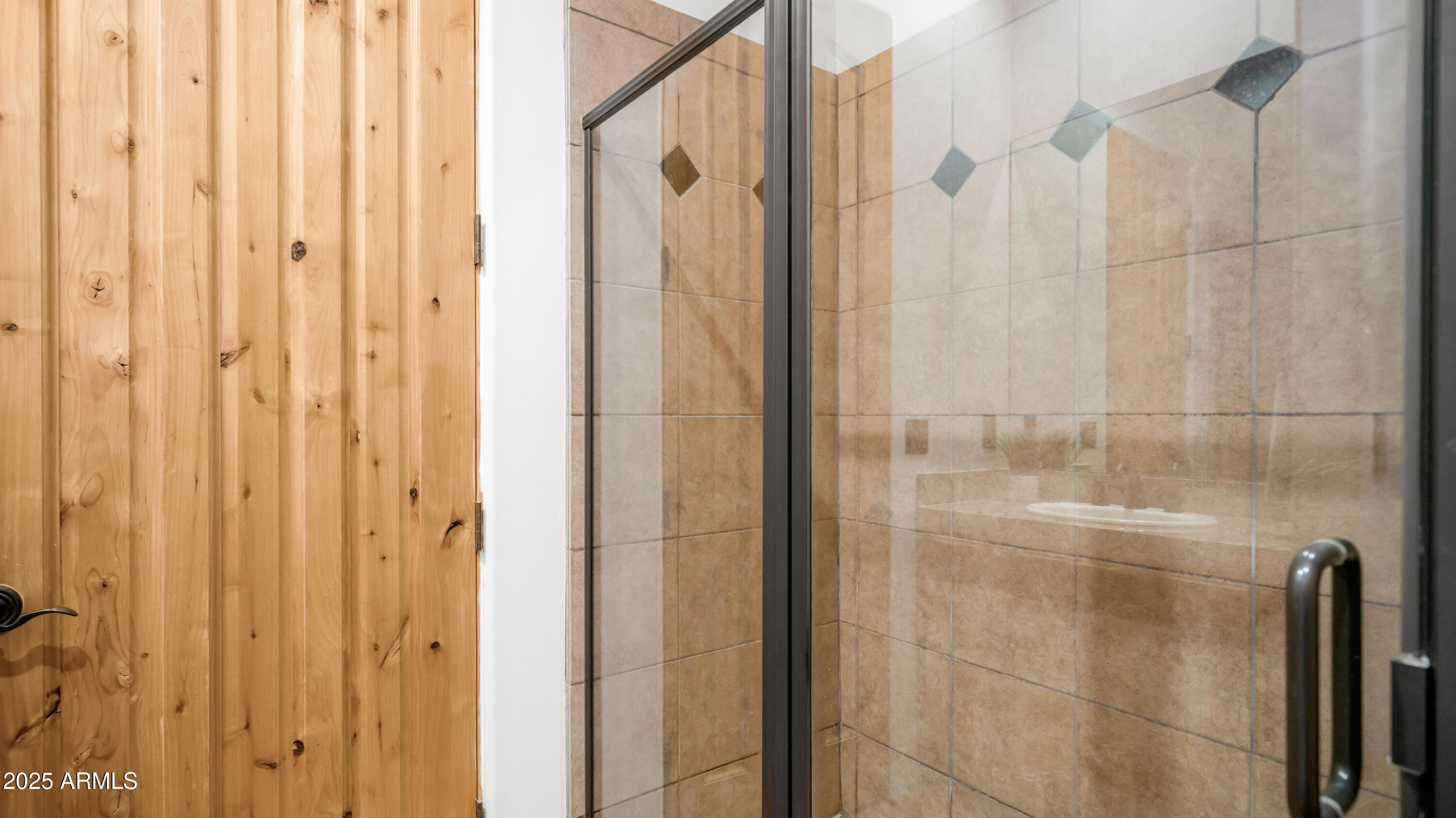 42215 North La Plata Road Scottsdale, AZ 85262 - Photo 40 of 93 a bathroom with a glass shower door