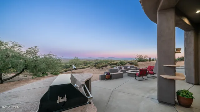 a view of a city with mountains in the background