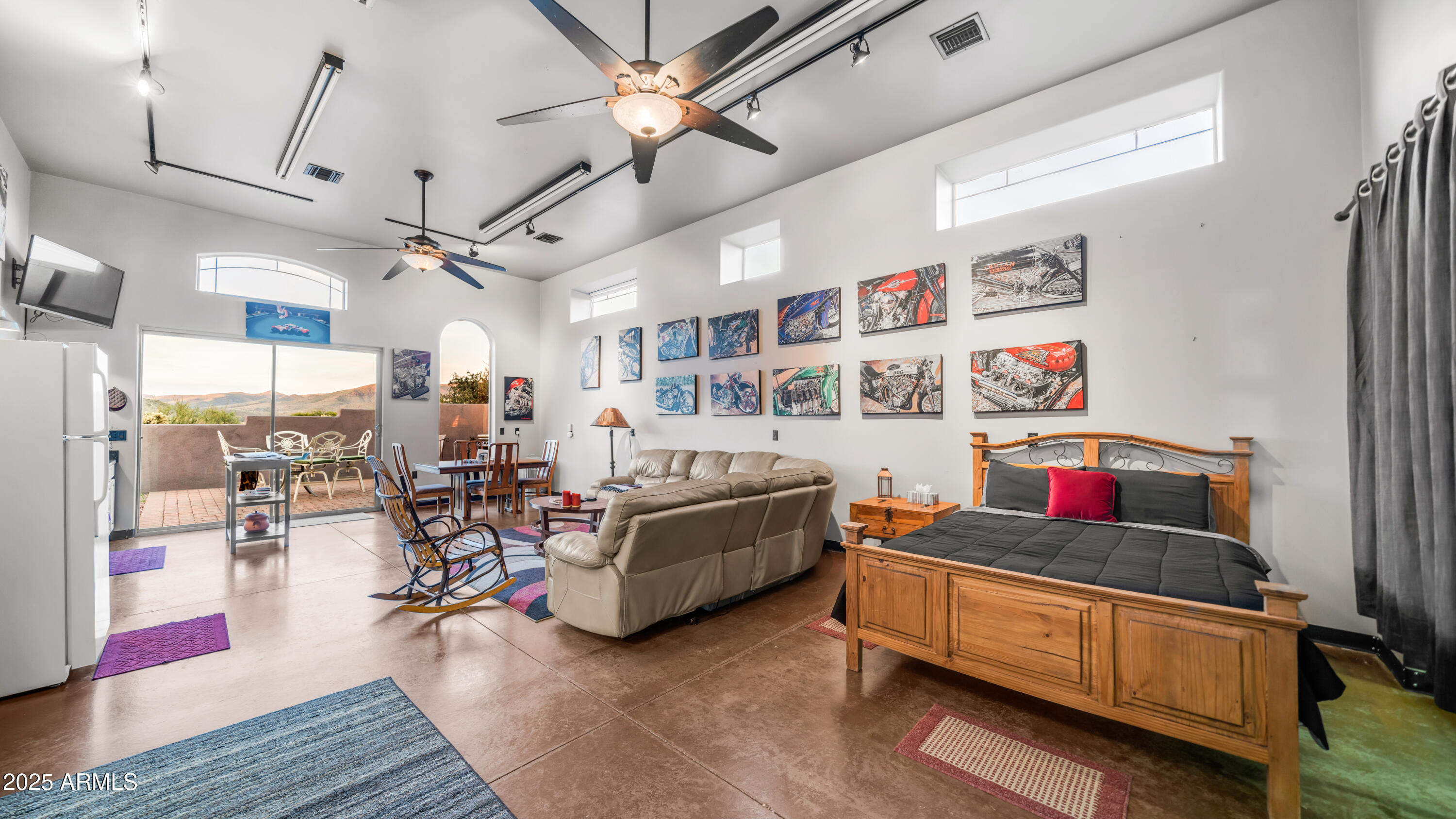 42215 North La Plata Road Scottsdale, AZ 85262 - Photo 54 of 93 a living room with lots of furniture and a wooden floor
