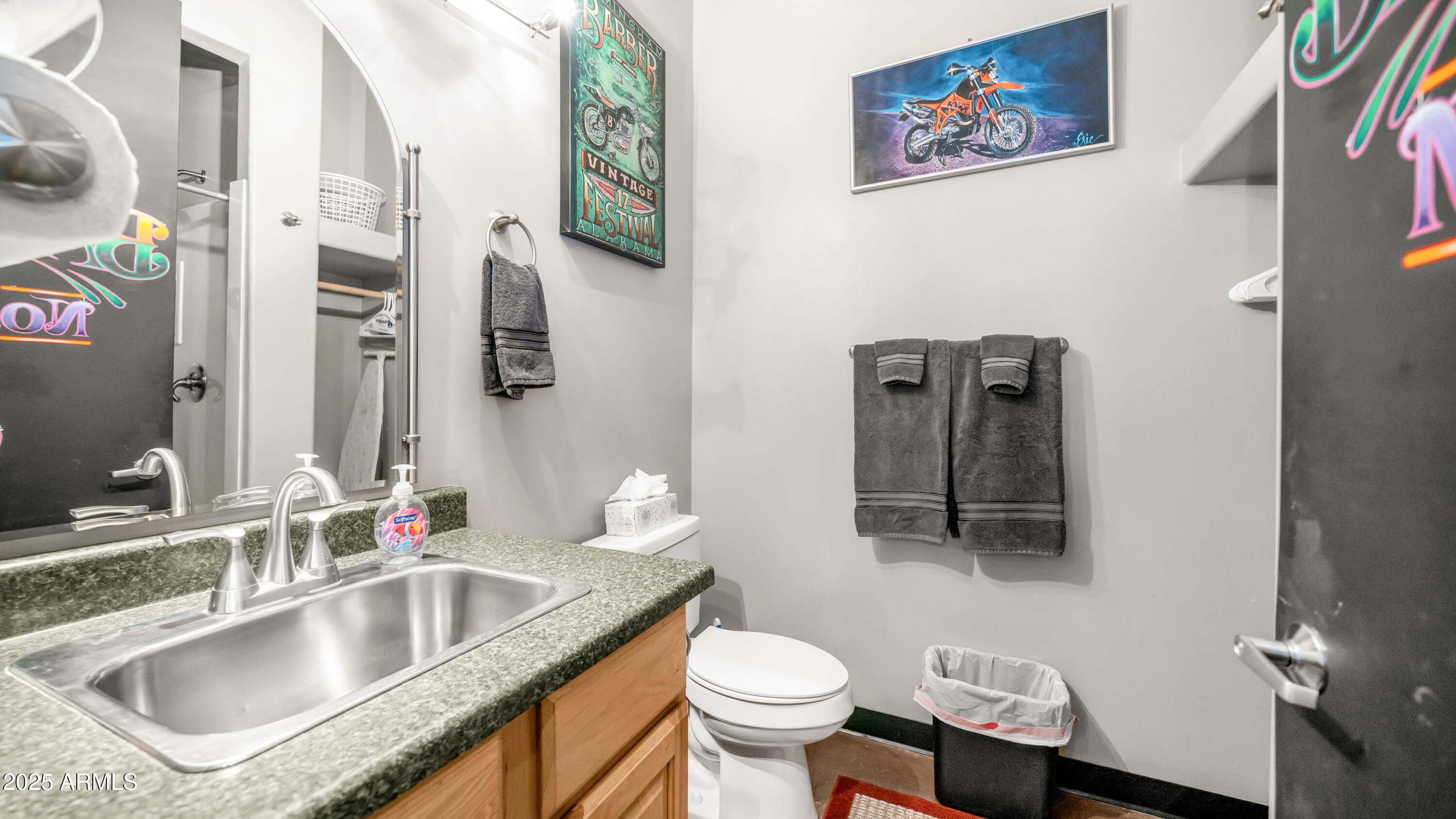 42215 North La Plata Road Scottsdale, AZ 85262 - Photo 62 of 93 a bathroom with a toilet sink and mirror