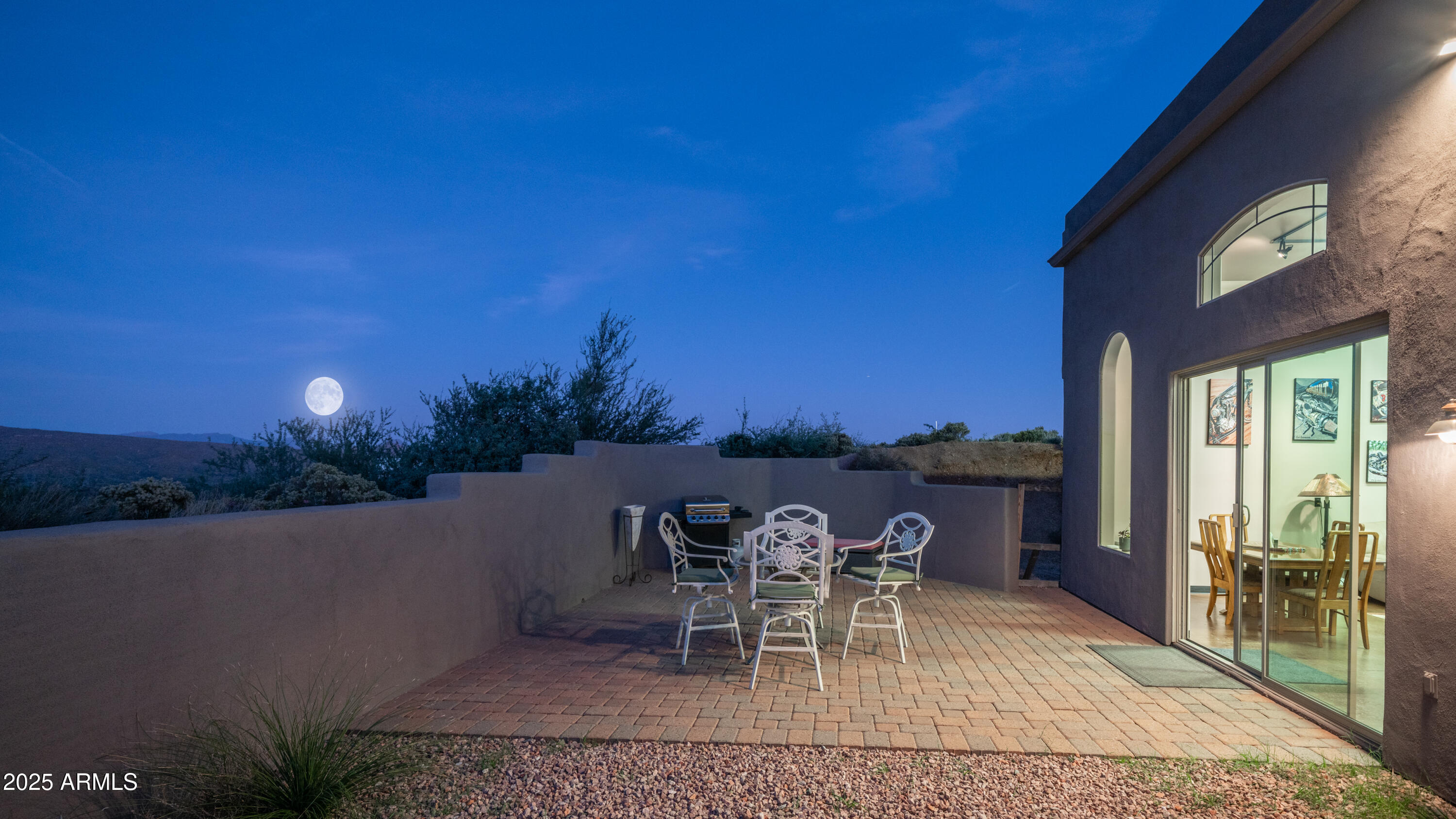 42215 North La Plata Road Scottsdale, AZ 85262 - Photo 65 of 93 a view of a patio with a table and chairs