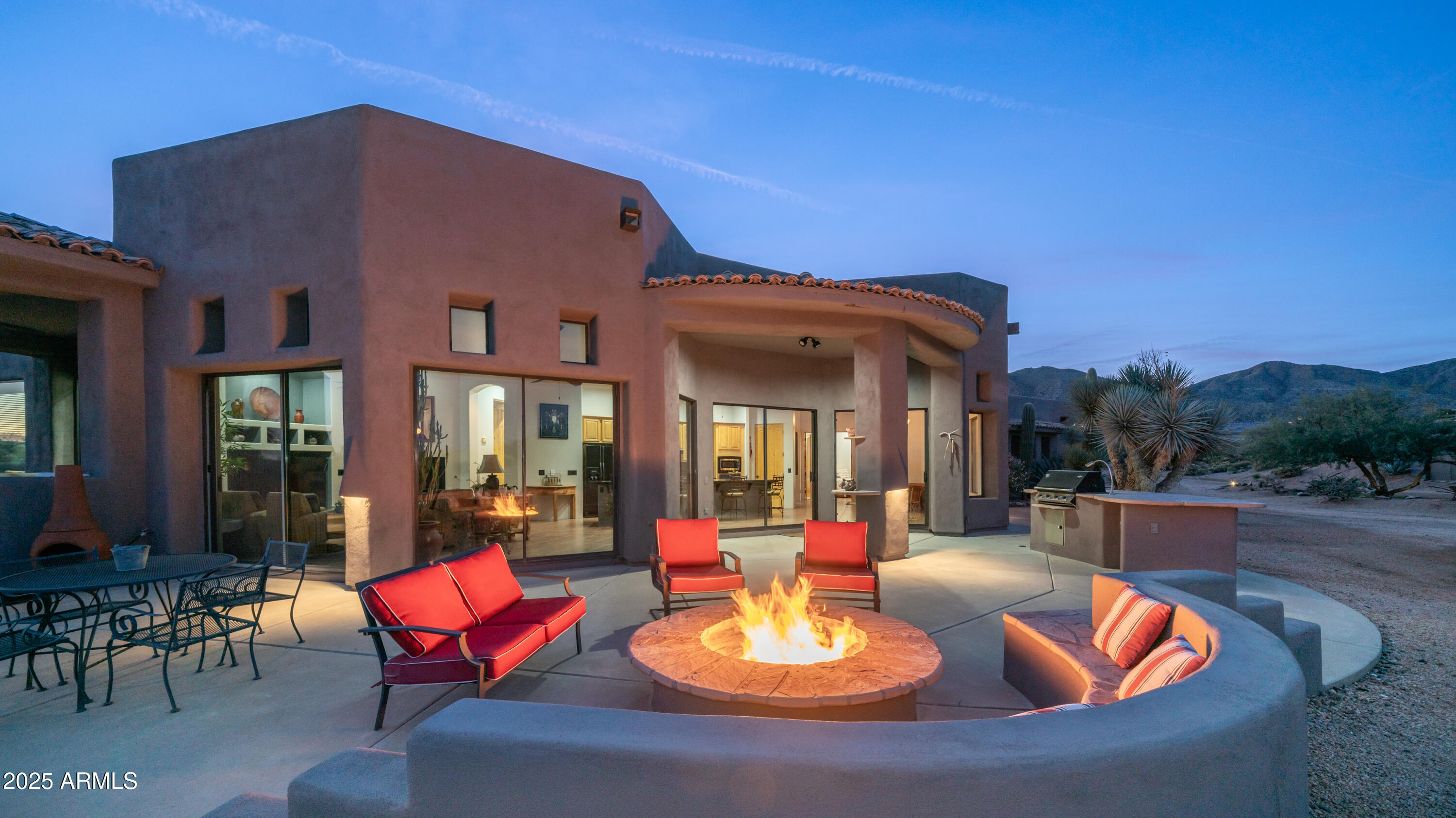 42215 North La Plata Road Scottsdale, AZ 85262 - Photo 85 of 93 a view of a house with swimming pool and sitting area