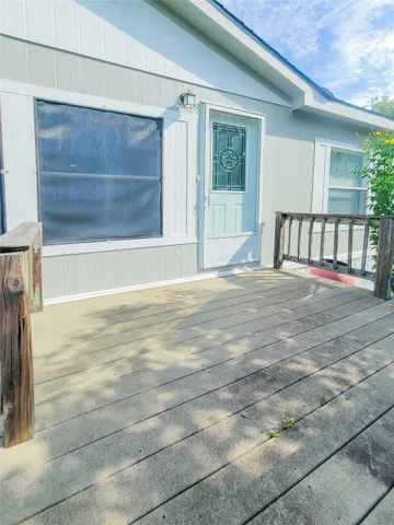a view of a backyard of a house