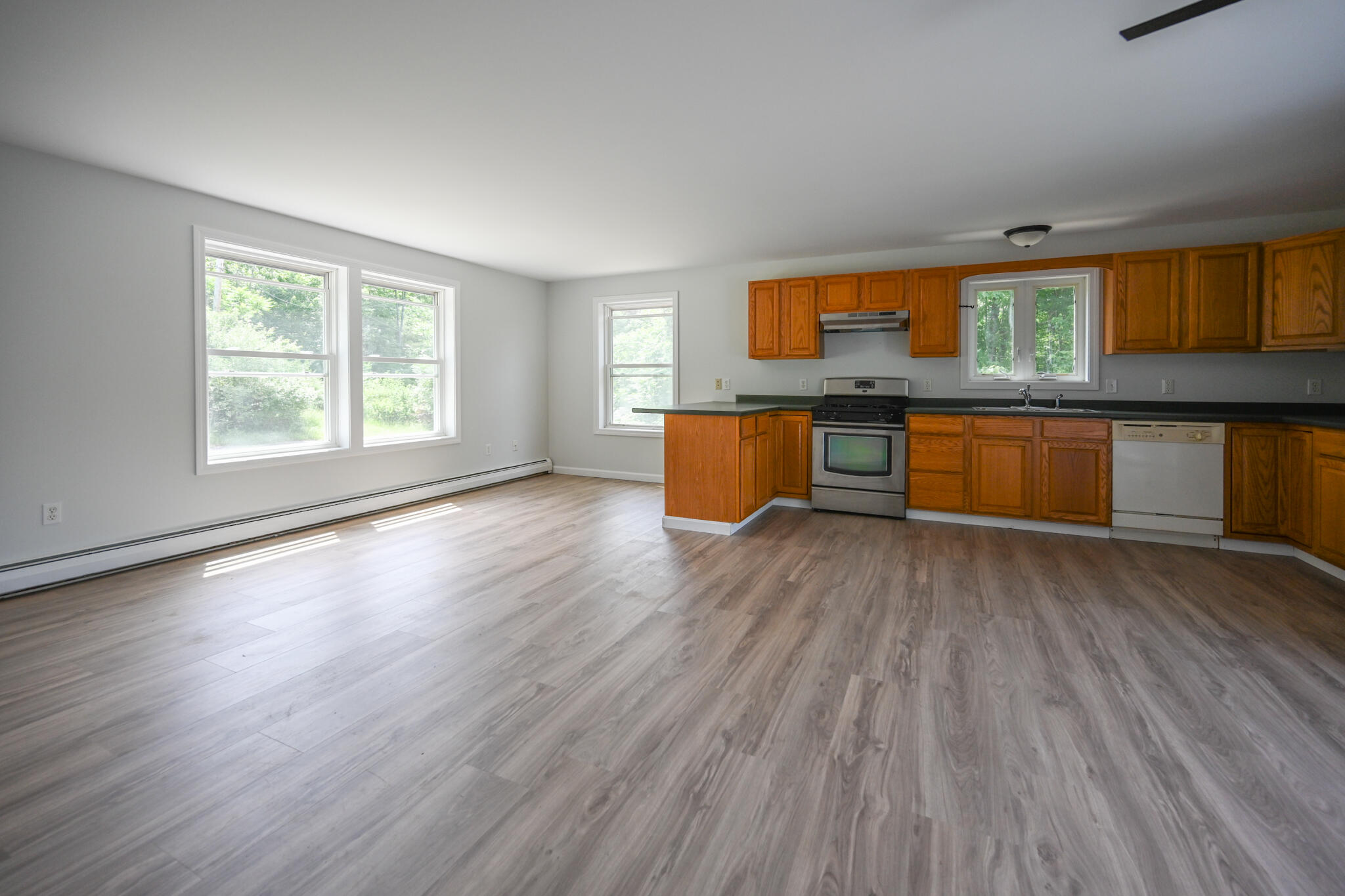 6 Garlands Way Limington, ME 04049 - Photo 14 of 46 Open kitchen, dining, living space