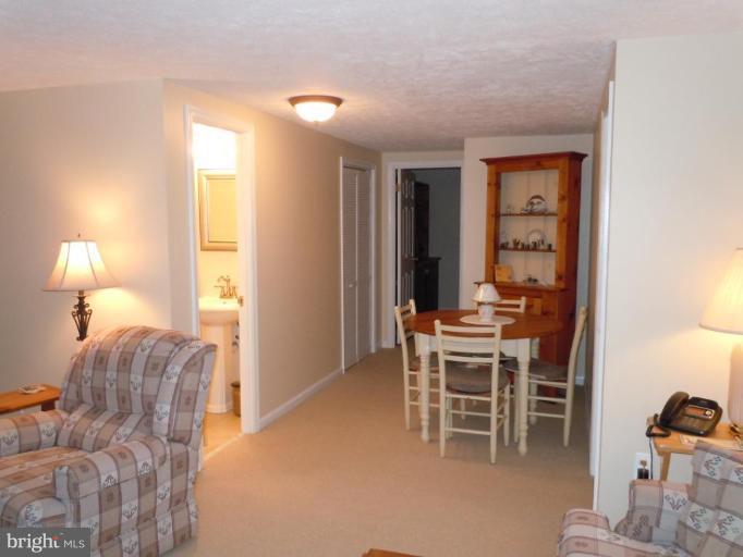 1079 Downton Road Halethorpe, MD 21227 - Photo 20 of 26 a dining room with furniture and a window