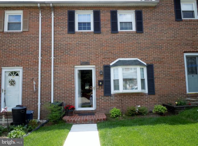 1079 Downton Road Halethorpe, MD 21227 - Photo 25 of 26 a front view of a house with garden