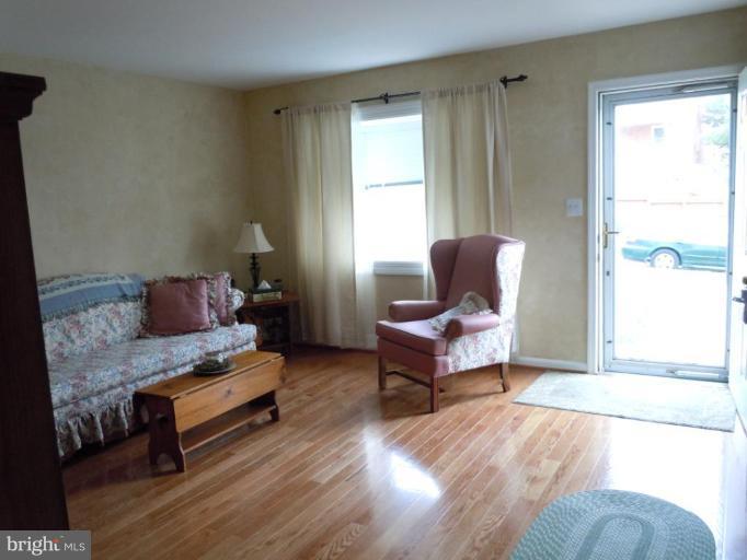 1079 Downton Road Halethorpe, MD 21227 - Photo 6 of 26 a living room with furniture and a window