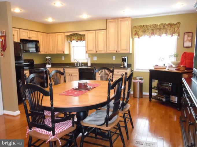 1079 Downton Road Halethorpe, MD 21227 - Photo 8 of 26 a view of a dining room with furniture window and outside view