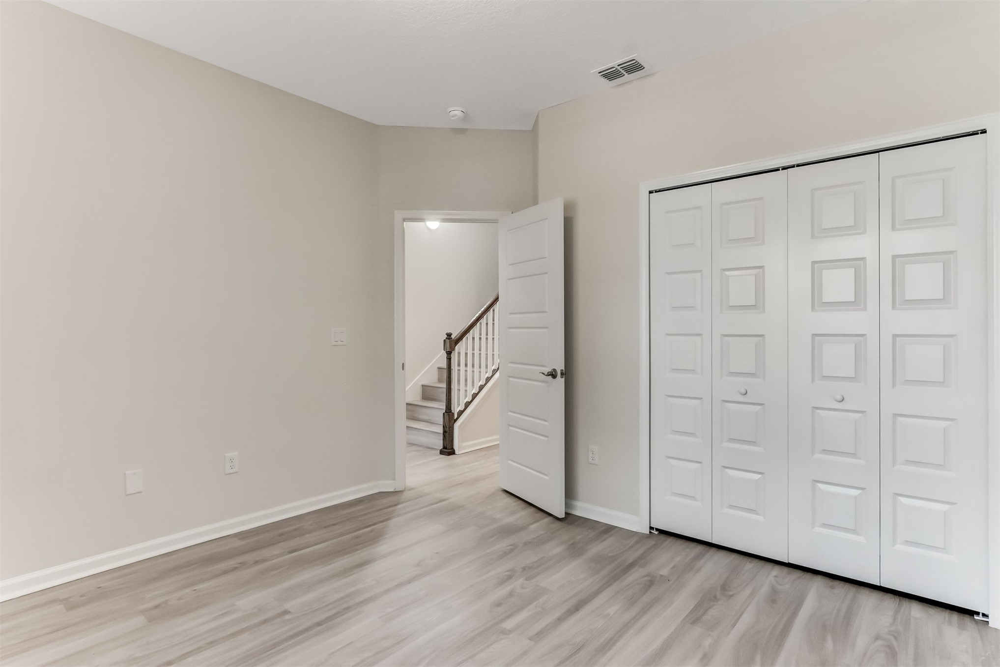 424 South 8th Street Fernandina Beach, FL 32034 - Photo 23 of 32 Downstairs bedroom, large closet