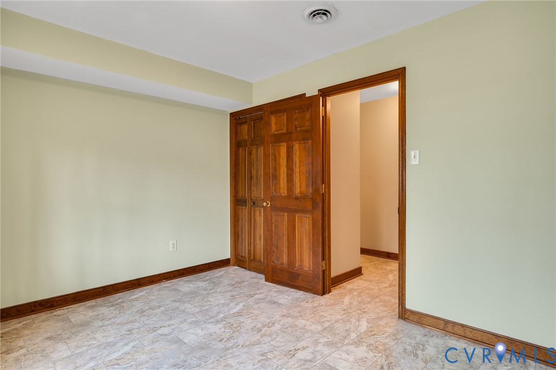 3123 Bradwill Road Richmond, VA 23225 - Photo 34 of 36 Unfurnished bedroom featuring baseboards