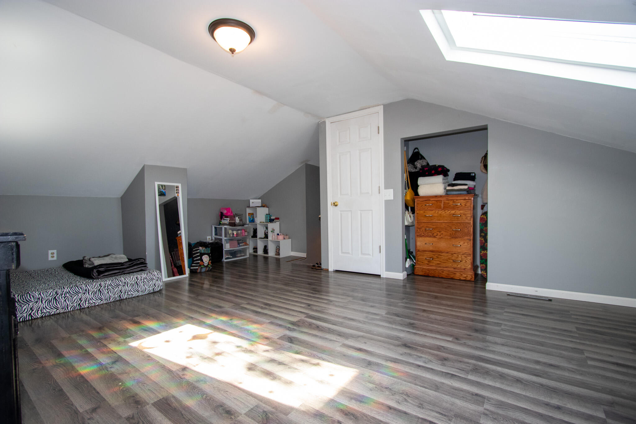 2401 Riverside Drive Lake Station, IN 46405 - Photo 12 of 28 a view of a livingroom with wooden floor and furniture