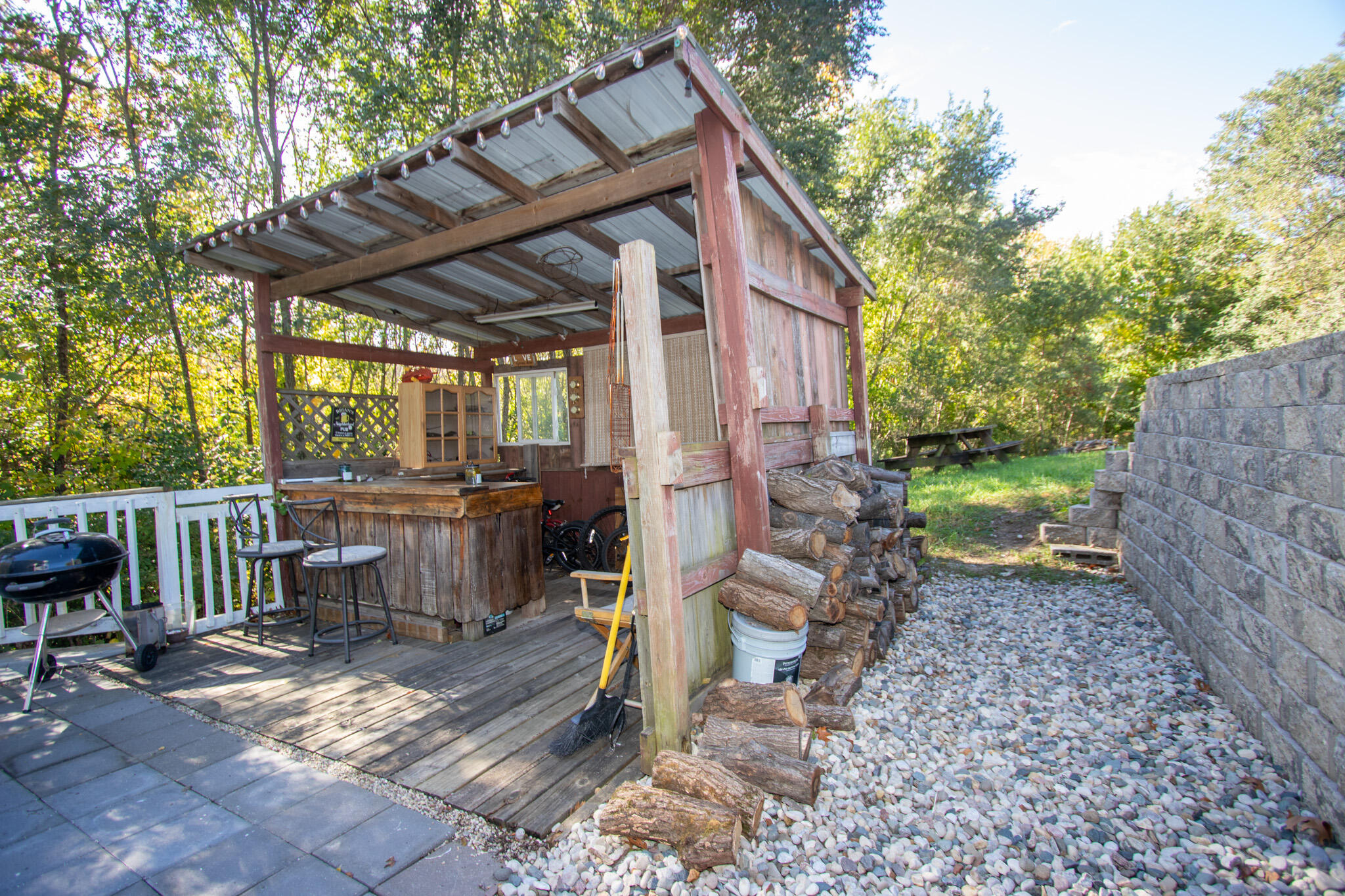 2401 Riverside Drive Lake Station, IN 46405 - Photo 26 of 28 a view of house with backyard outdoor seating and green space