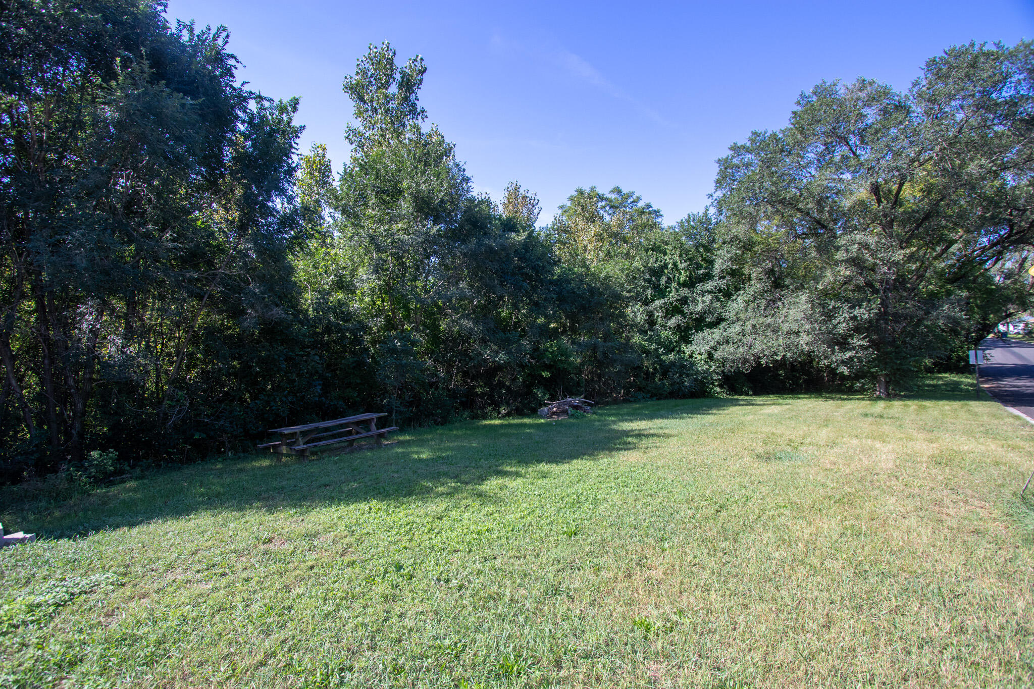 2401 Riverside Drive Lake Station, IN 46405 - Photo 4 of 28 a backyard of a house with lots of green space