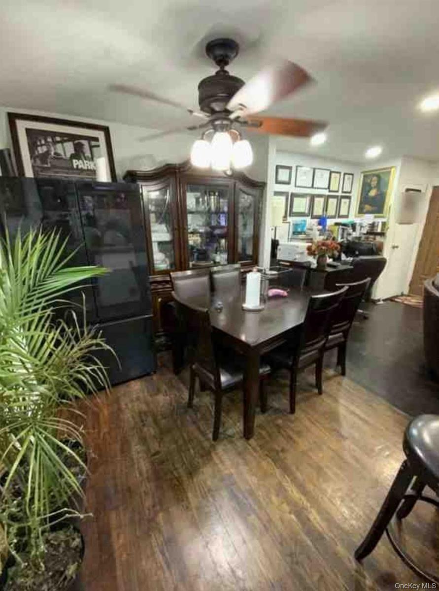 153-12 111th Road Queens, NY 11433 - Photo 3 of 15 a view of a dining room with furniture