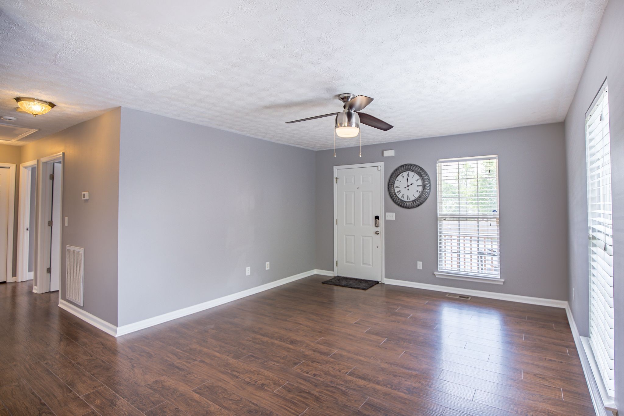 121 Rothwood Court Madison, TN 37115 - Photo 4 of 21 an empty room with wooden floor and window