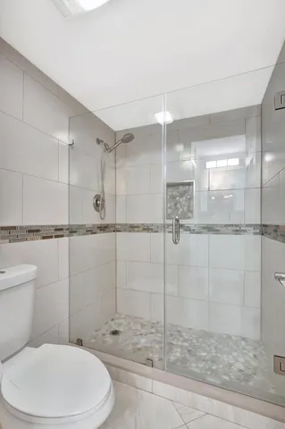 a view of house with backyard space and balcony