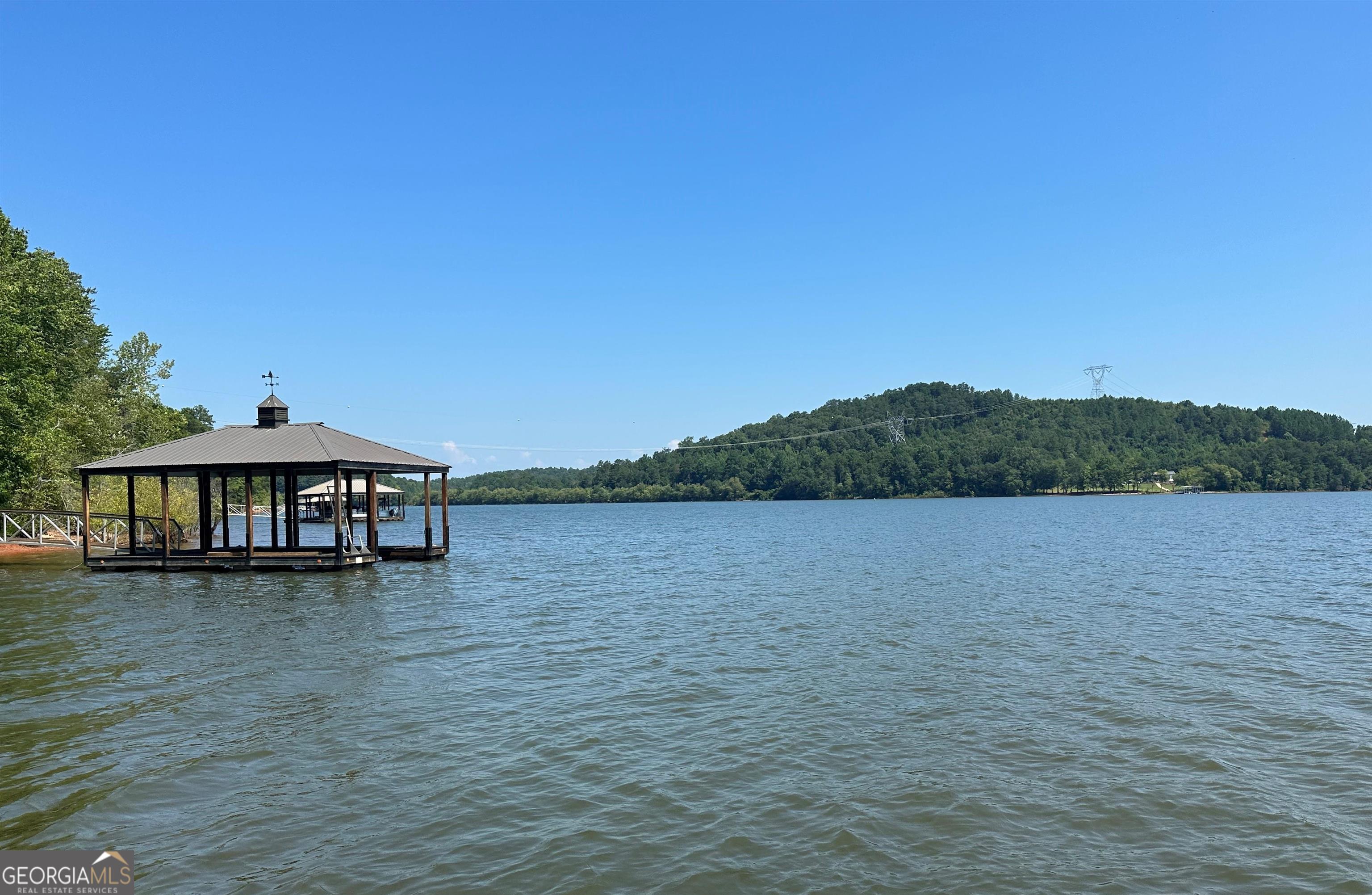 13-35 Edgewater Trail, Unit 2 35 ACRES) Toccoa, GA 30577 - Photo 17 of 22 a view of a lake with a yard