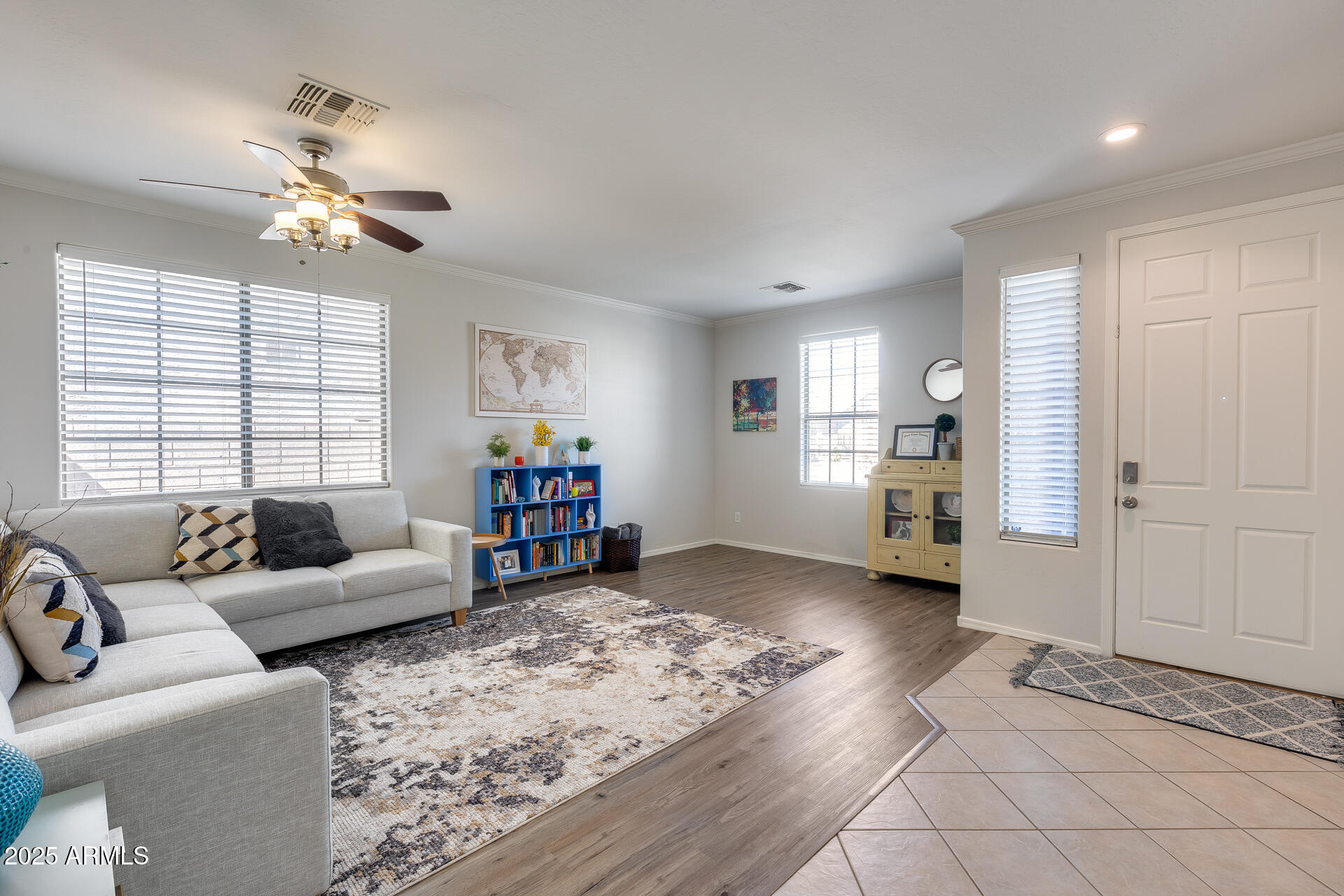 14229 West Calavar Road Surprise, AZ 85379 - Photo 2 of 44 a living room with furniture and a window