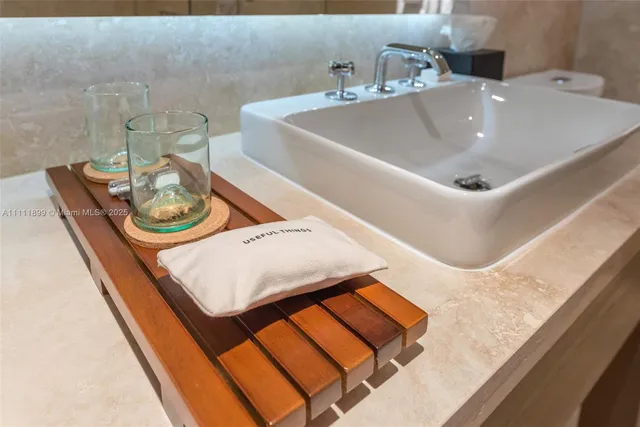 a bathroom with a bathtub and a sink