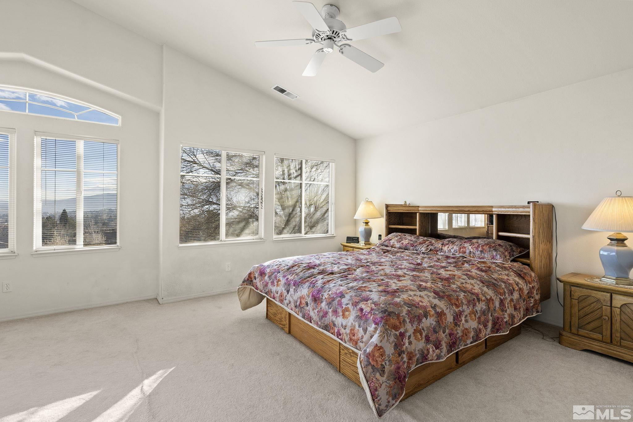 5364 Tappan Court Reno, NV 89523 - Photo 20 of 40 a bedroom with a large bed and a large window