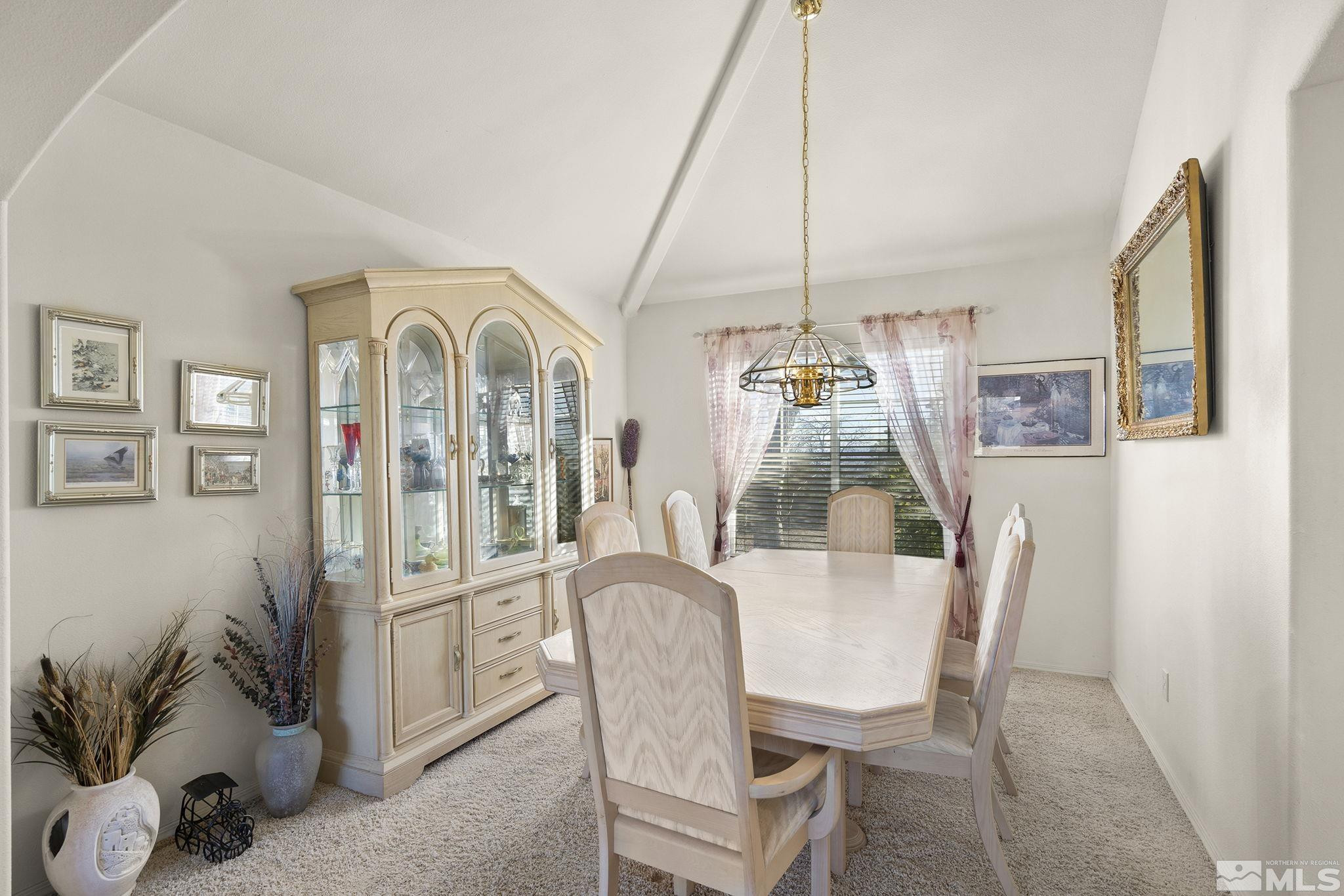 5364 Tappan Court Reno, NV 89523 - Photo 10 of 40 a view of a dining room with furniture window and wooden floor