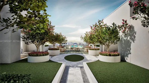 a swimming pool with outdoor seating and yard